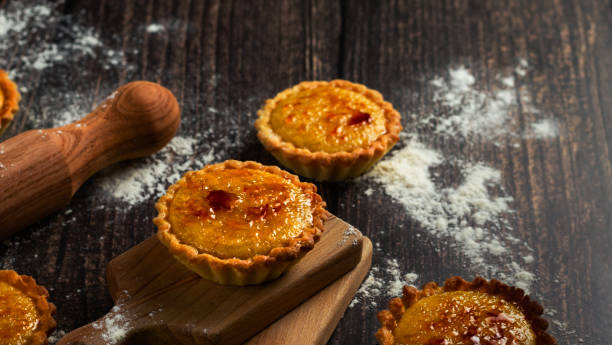istock Tart with vanilla-pear cream brulee, top view. 1423164239
