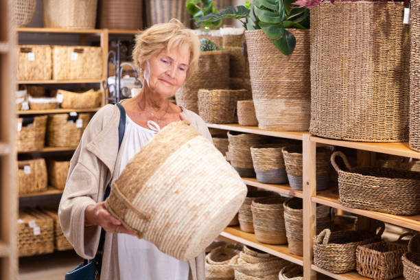 istock Mature woman buying storage basket 1423165231