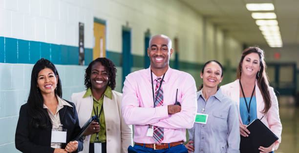istock African-American man leads school staff 1423165697