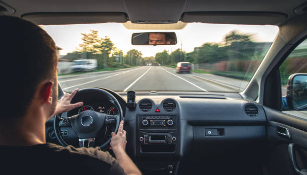 istock Hands on the wheel when driving at high speed from inside the car. 1423166767