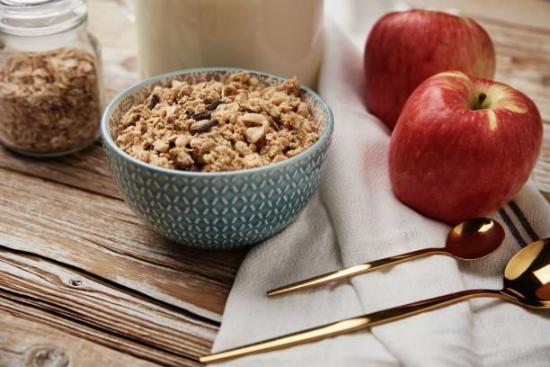 istock Morning breakfast with granola on wooden background 1423168834