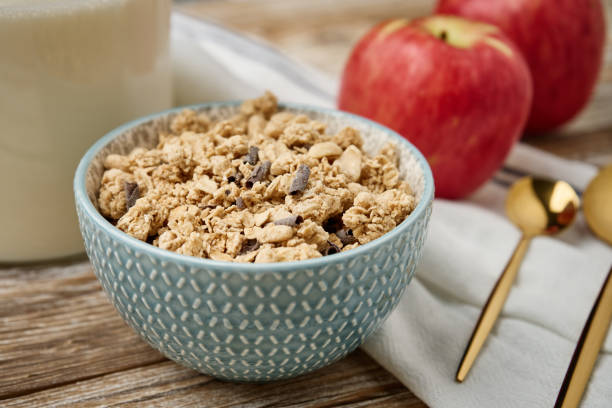 istock Morning breakfast with granola on wooden background 1423168841