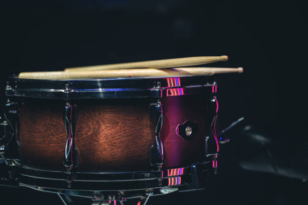 istock Close-up, snare drum on a dark background isolated, copy space. 1423169005