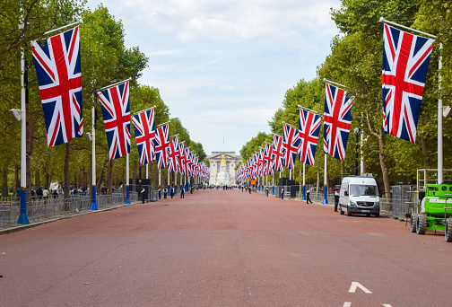 London, UK - September 12 2022: Union Jacks have been installed along The Mall leading to Buckingham Palace ahead of the Queen's funeral.