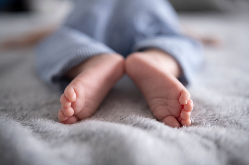 lose-up of cute little baby feet of a baby boy.