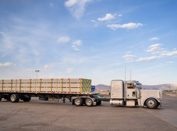 White semi transporting sheetrock drywall in Utah, USA