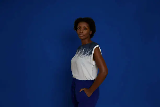 Black Woman Casual Business portrait on blue background