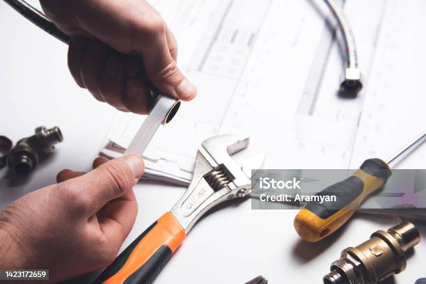 Plumber Putting Seal Tape On A Thread Stock Photo - Download Image Now - Close-up, Thread - Sewing Item, Bathroom