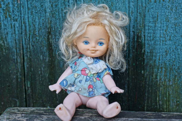 istock one plastic doll in a colored dress and white hair 1423177600