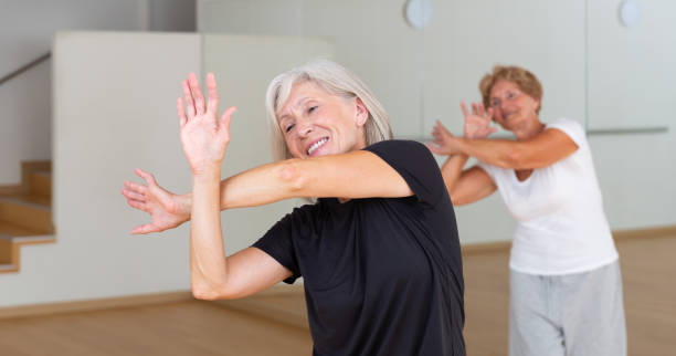 istock Portrait of an elderly dancing woman practicing vigorous swing 1423180660