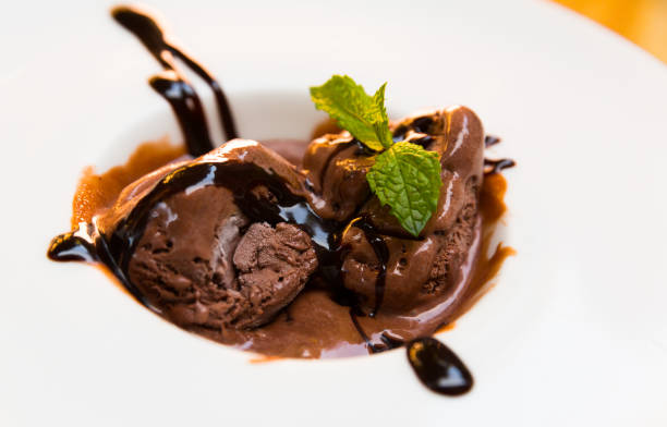 istock Homemade chocolate ice cream with chocolate cream and mint 1423184327