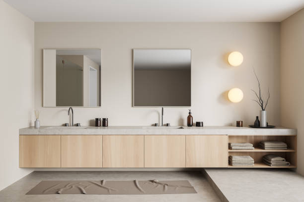 istock Light bathroom interior with sink and mirror, accessories on dresser 1423186088