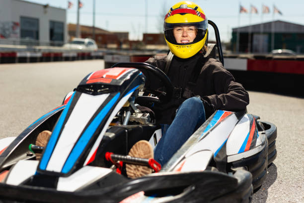 istock Female driving car for karting 1423187868