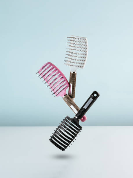 istock combs for hair on a blue background 1423190536
