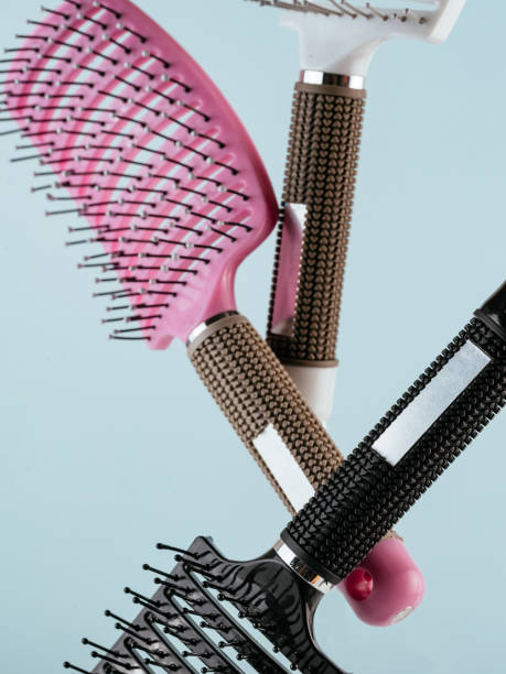 istock combs for hair on a blue background 1423190538