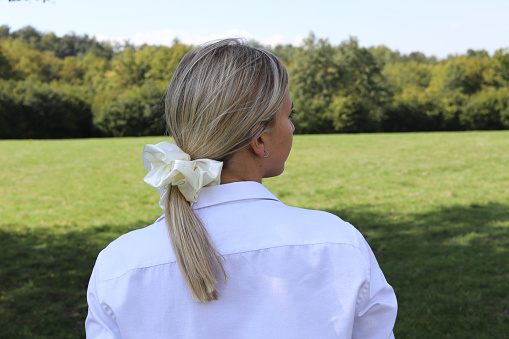 Satin scrunchies for hair that is tied in a ponytail. Satin rubber bands.