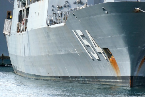 A Canadian Navy warship docked at pier.