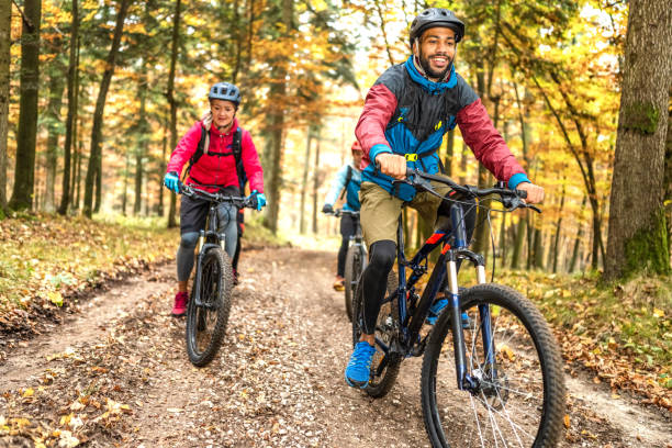 istock Young people enjoying ride on path in nature 1423206994