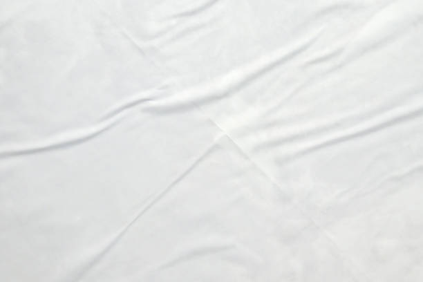 istock white crumpled and creased paper poster texture background 1423207015