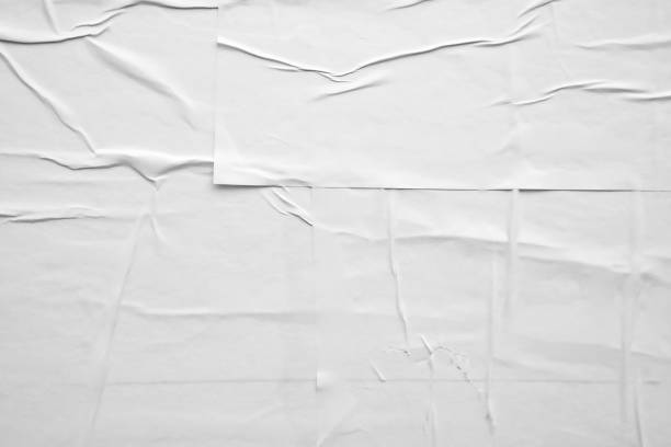 istock white crumpled and creased paper poster texture background 1423207020