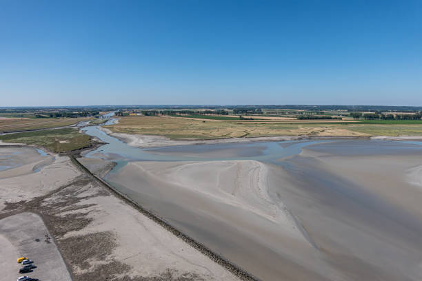 istock Couesnon river approaching Mont St. Michel, France 1423208271