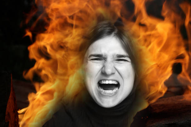 A portrait creatively combined with fire flames and smoke in a visual illusion