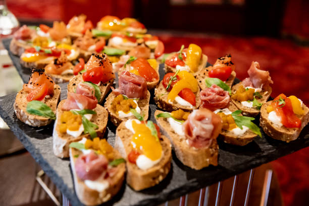istock many different sandwiches with fish and vegetables on a granite stand 1423211140