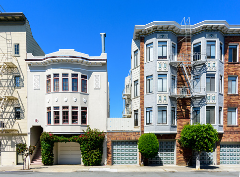 Exterior view of typical low rise historic residential buildings on Chestnut street in San Francisco, California.