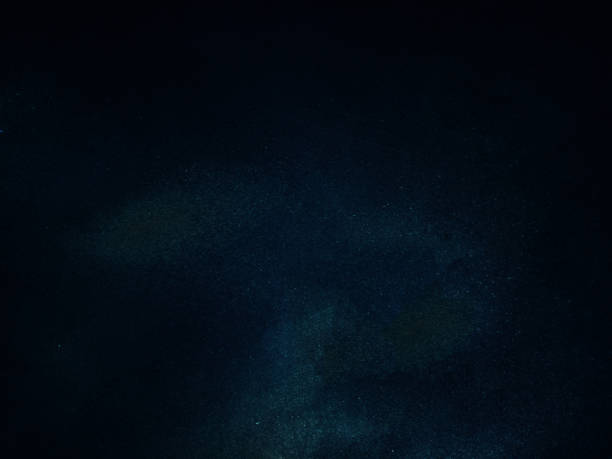 istock Dark rough cement wall background for graphic design or wallpaper. 1423227001