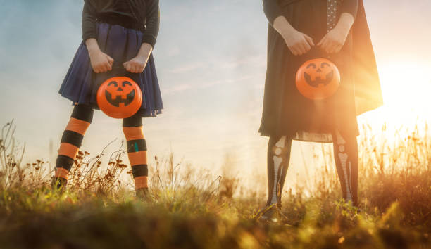 istock kids at Halloween 1423242858