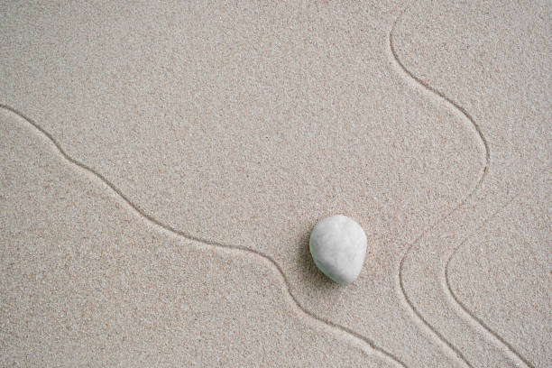 istock Japanese Zen Garden with Pebble with Line on Sand 1423244964