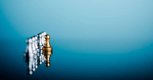 Creative leadership and differentiated business ideas Developing an organizational strategy towards innovation The chess pieces are laid out on the ground and are distinguished by color.