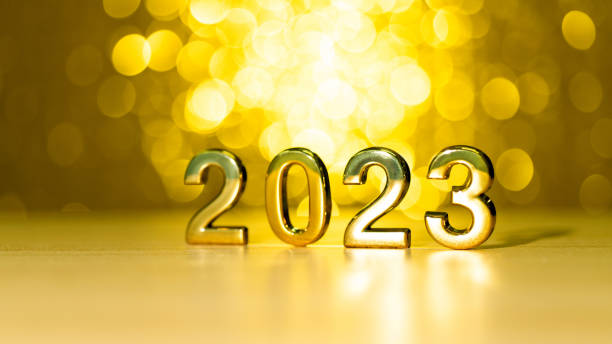istock Number 2023 on shiny golden background 1423247884