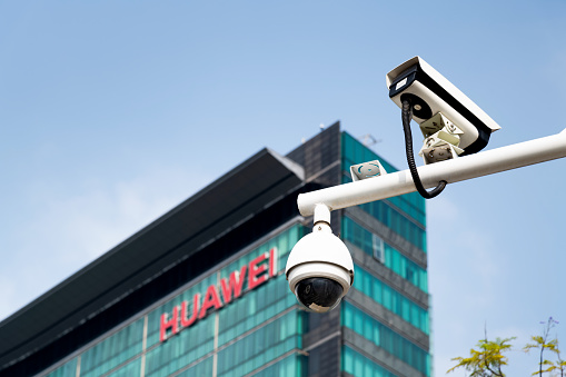 Shenzhen, China - October 29, 2021 - Security camera outside the of the R&D building of Huawei Headquarters in Longgang District of Shenzhen city, Guangdong Province, China. A multinational networking and telecommunications equipment and services company.