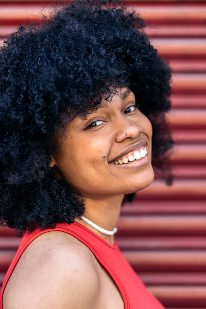 istock Happy Afro Woman Portrait 1423259606