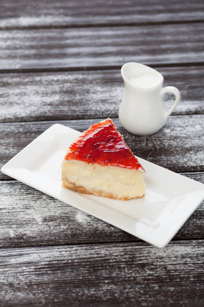 istock strawberry cheesecake and slice on table 1423266027