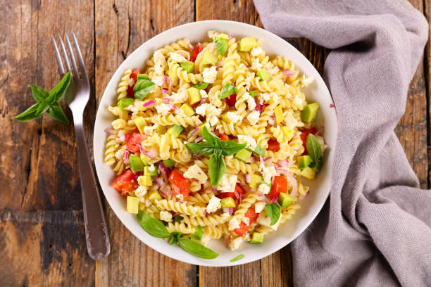 istock mixed pasta salad with tomato,  basil and cheese 1423266529