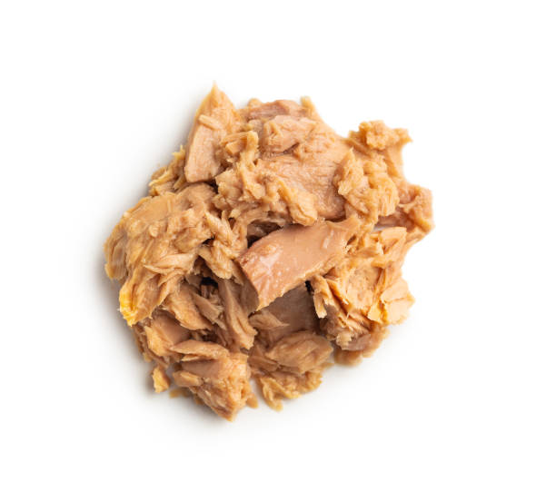 istock Canned tuna fish isolated on white background. 1423268229