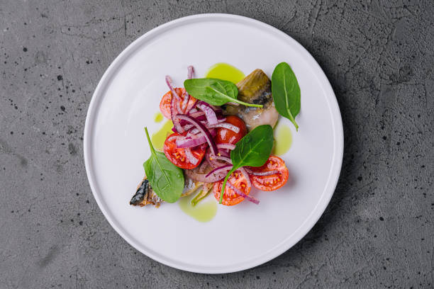 istock Mackerel with cherry tomatoes and red onions 1423270728