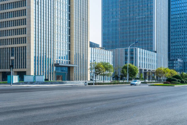 istock empty urban road with modern building in the city 1423270952