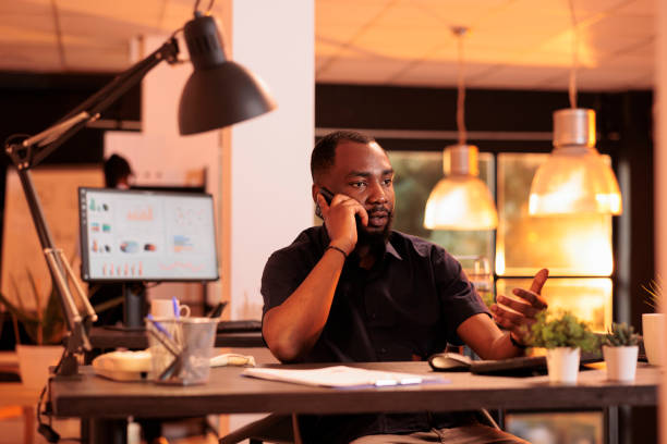istock African american businessman talking on mobile phone 1423276442