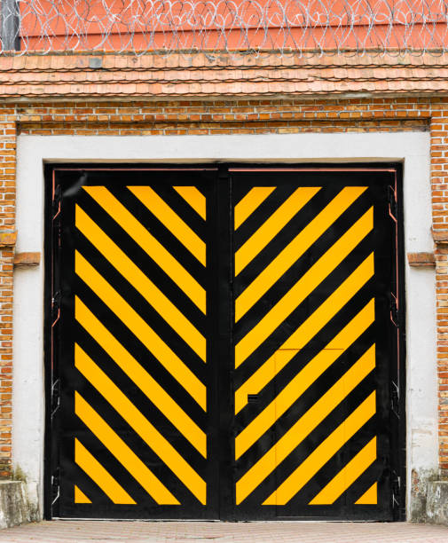 istock Traditional prison doors and concrete walls 1423277905