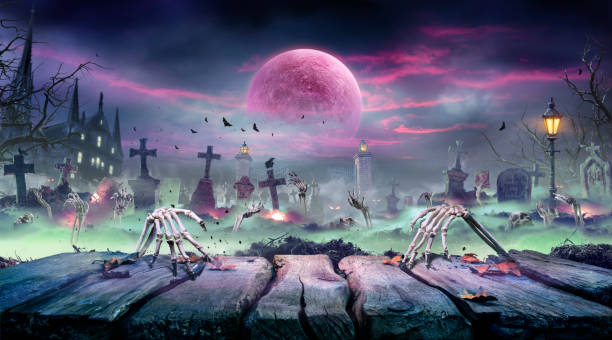 halloween - zombie rising on wooden table - skeletons party in spooky grave at nights with blood moon - skull gothic style evil dark fotografías e imágenes de stock