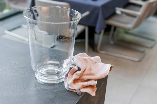 glass vase and kitchen towel stock photo
