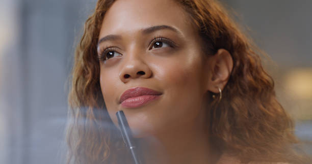 istock Idea, thinking and inspired business woman with vision, goal or mindset for creative copywriting, newsletter or strategy proposal. Thoughtful, content inspiration of a young black woman brainstorming 1423284850