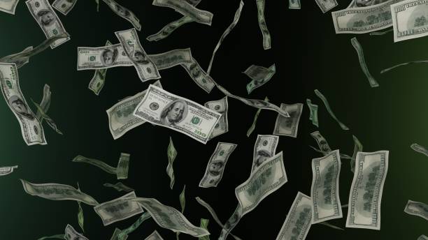 istock 100 Dollar bills falling down. Banknotes. Money rain. 1423284983