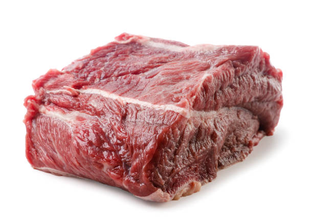 istock Raw beef close-up on a white background. isolated 1423285293