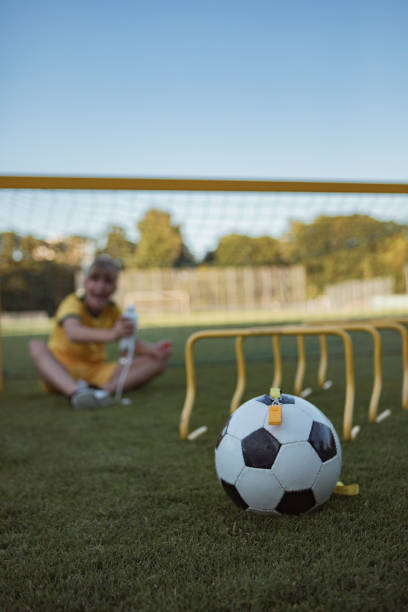 istock Soccer daughter resting during a coaching session 1423286750