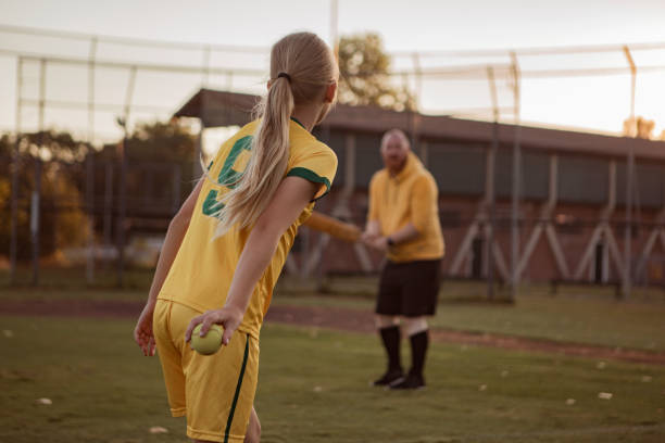 istock Cricket father and daughter working hard during a coaching session 1423287103