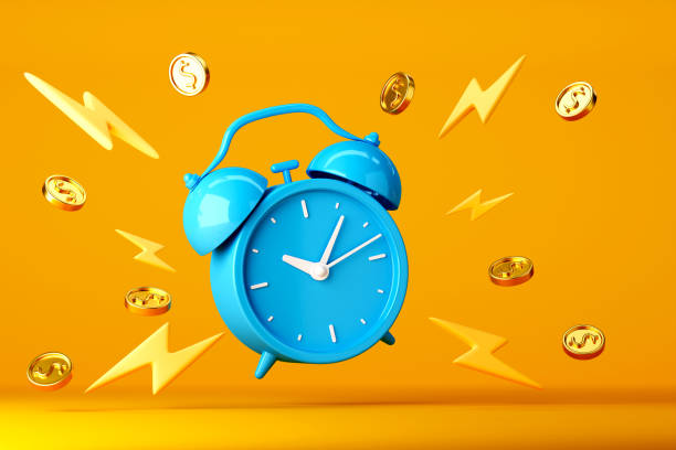 istock Blue alarm clock with floating around on bright yellow background 1423287108